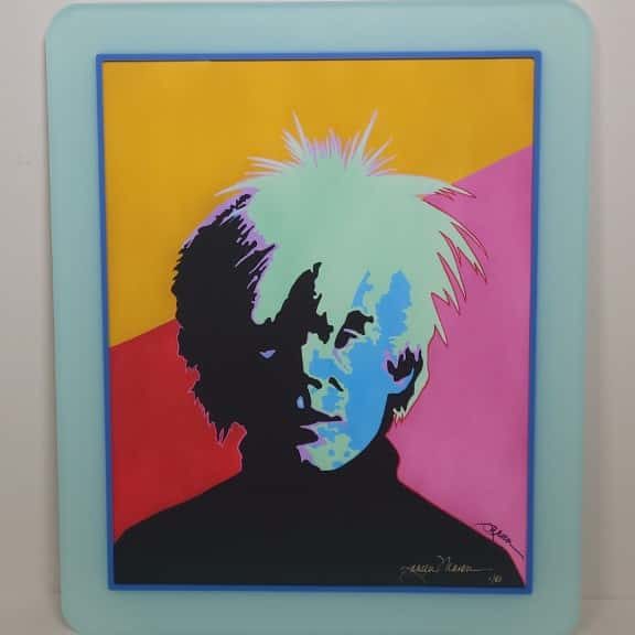 A limited edition giclee portrait of Andy Warhol by National Award-Winning Illustrator/ Author Janeen Mason. Donated by Nancy & Kent Politsch.